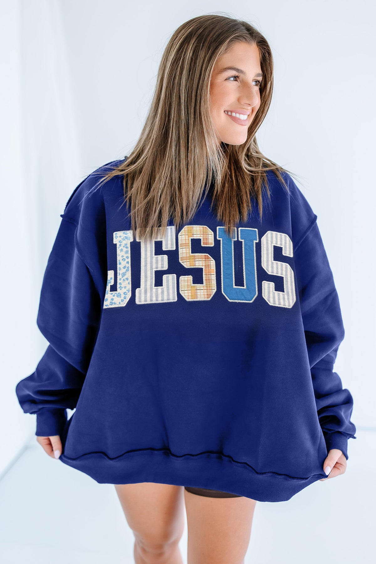 Bonbon WWJD Mixed Pattern Embroidered Patch Graphic Mock Neck Sweatshirt